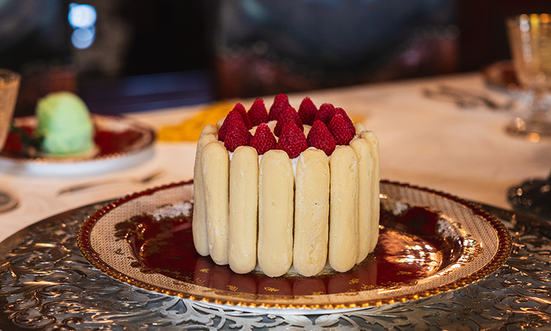 a faux cake sits on a plate