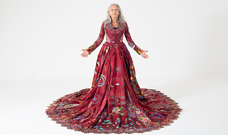 The Red Dress worn by UK artisan Diana Milstein. Photo by Sophia Schorr-Kon.